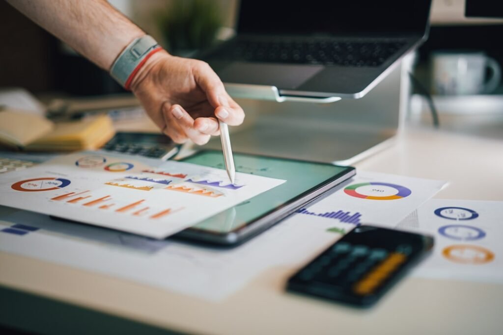 Property data and charts being reviewed on a tablet
