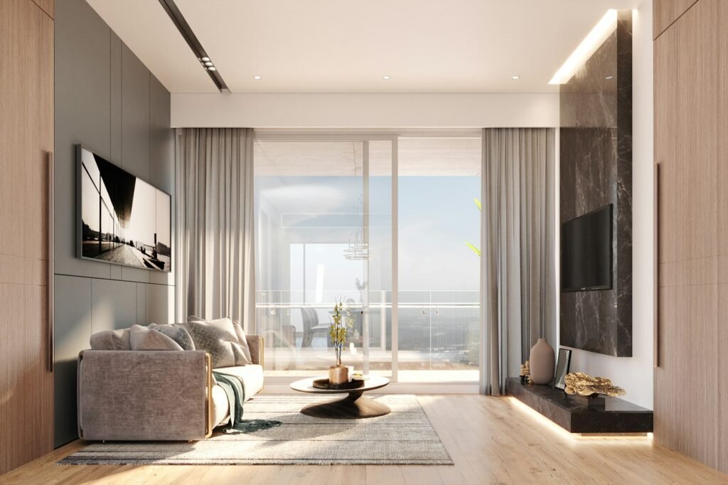 Modern apartment living room with large windows, as presented in a new development